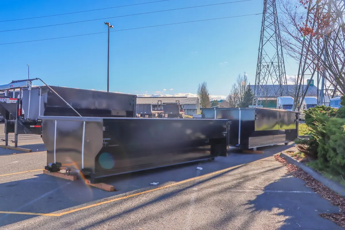 Roll-off dumpster ready for waste disposal at job site for Residential Dumpster Rental in Trenton
